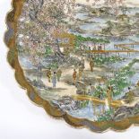 A Japanese Meiji Period Satsuma porcelain bowl, with lobed surround and hand painted detailed gilded