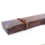 A brass-bound leather shotgun case, circa 1900, length 111cm