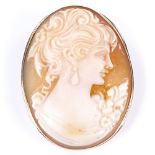 A relief carved shell cameo panel brooch/pendant, depicting female portrait in 9ct frame, brooch