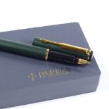 A Parker mat green fountain pen, new and boxed