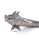 A Spanish silver articulated fish, with cabochon green glass eyes, and bright-cut engraved scales,