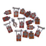 15 Georg Jensen silver and red enamel badges, decorated with the Danish Royal Crown, together with