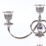 An Iranian silver 2-branch 3-light candelabra, with detailed engraved and relief embossed floral