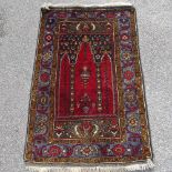A Persian Tribal design rug, 4'10" x 3'1"