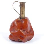 A brass-mounted natural amber flagon, height 8.5cm