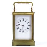 A French 8-day brass-cased carriage clock, striking on a gong, case height 13cm