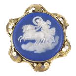 A Victorian Wedgwood Jasperware circular panel brooch, depicting lady on chariot, in pierced foliate