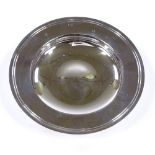A modern circular silver dish, by Garrard & Co Ltd, hallmarks London 1994, diameter 14.5cm, 5.5oz,