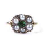 An unmarked yellow metal green stone and split-pearl panel ring, panel height 10.7mm, size L, 1.8g