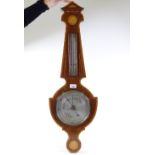 An Edwardian mahogany and satinwood inlaid aneroid wall barometer and thermometer