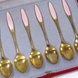 A set of 6 Danish sterling silver-gilt and pink enamel coffee spoons, by Frigast, length 9.5cm