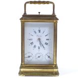 A French 8-day brass-cased carriage clock, with repeat movement striking on a gong, case height 15cm