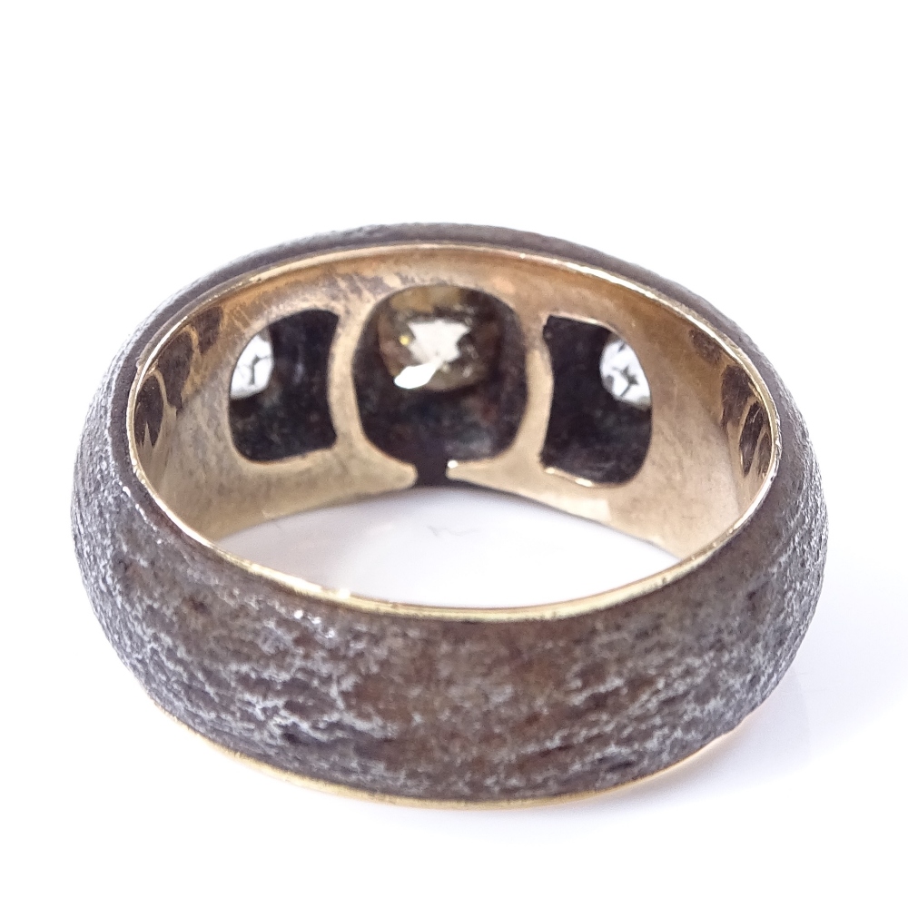 An unmarked gold and silver 3-stone champagne and colourless diamond gypsy ring, setting height 8. - Image 3 of 4