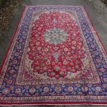 A large Persian Saruq hand knotted rug, 11'10" x 7'6"
