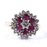 An 18ct gold ruby and diamond cluster flowerhead ring, setting height 13.7mm, size L, 5.1g