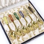 A set of 6 Danish sterling silver-gilt and coloured enamel teaspoons, with stylised floral