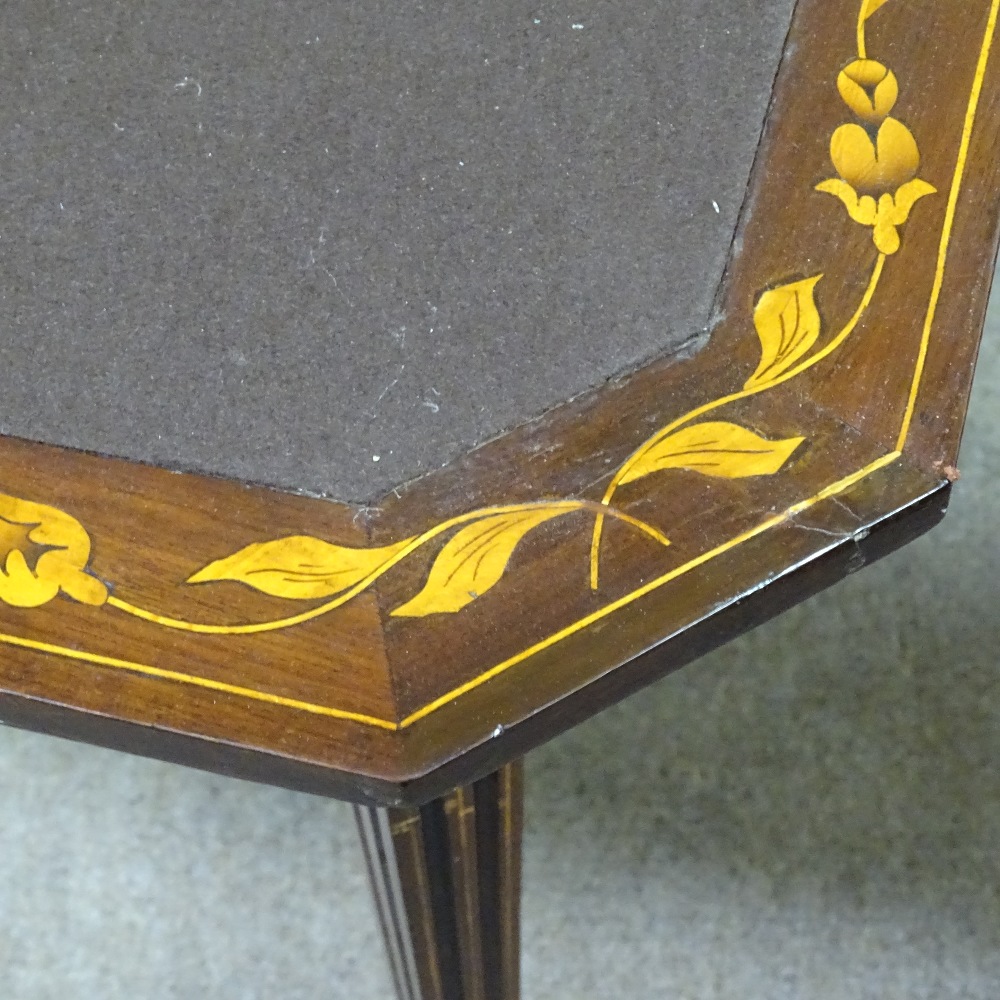 An 18th century Dutch marquetry folding card table, on original fluted tapered and inlaid legs, - Image 4 of 4