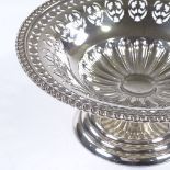 A Birks sterling silver pedestal bon bon dish, with pierced surround and floral border, diameter