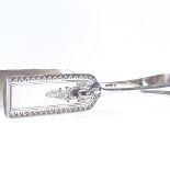 A pair of Victorian silver asparagus tongs, with bright-cut foliate engraved decoration, by Martin