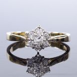 A 9ct gold diamond cluster flowerhead ring, total diamond content approx 0.25ct, setting height 8.