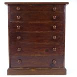 A stained wood table-top chest of 6 drawers, width 38cm, height 45cm