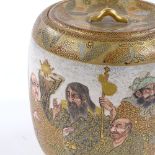 A Japanese Meiji period Satsuma jar and cover, hand painted and gilded group of figures, signed
