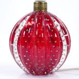 Whitefriars ruby glass lamp base with internal bubble design, 11cm diameter, height 13cm