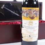 A bottle of 1987 Chateau Mouton Rothschild Pauillac, in presentation box