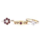 2 9ct gold stone set rings, 3.2g, together with an unmarked gold stone set ring, 1.6g (3)