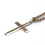 A 9ct gold cross pendant necklace, on 9ct rope twist chain, pendant height excluding bale 36.6mm,