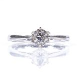 An 18ct gold solitaire diamond ring, diamond approx 0.33ct, size J, 2.3g