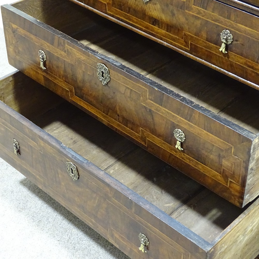 An 18th century walnut chest of 3 long drawers, with feather-banded and quarter veneered top, - Image 4 of 4