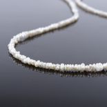 A single-strand Matinee seed pearl necklace, with unmarked gold clasp, necklace length 21", 5g