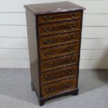 An Edwardian mahogany and satinwood crossbanded tall chest of 7 drawers on bracket feet, width 23.