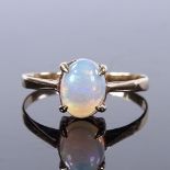 A 9ct gold cabochon opal ring, opal approx 0.78ct, size O, 1.1g