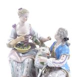 A Meissen porcelain group of a courting couple and a sheep, height 19cm