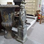 A weathered concrete garden statue of a Classical soldier on square pedestal, overall height 5'2"
