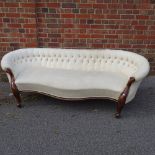 A Victorian walnut-framed bow-end parlour sofa, with buttoned upholstered, length 6'6"