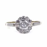 An 18ct gold diamond cluster flowerhead ring, with platinum-topped settings, setting height 7.6mm,