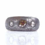 An unmarked gold and silver 3-stone champagne and colourless diamond gypsy ring, setting height 8.
