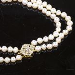A double-strand choker pearl necklace, with 18ct gold diamond set flowerhead clasp, pearl diameter