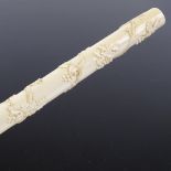 A 19th century French ivory needle case, with relief carved entwined grapevines, dated 1868,