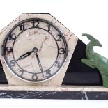 An Art Deco 2-colour marble-cased clock garniture, surmounted by green patinated spelter antelope,