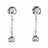 A pair of 18ct white gold diamond drop earrings, height excluding fitting 22mm, 3.8g