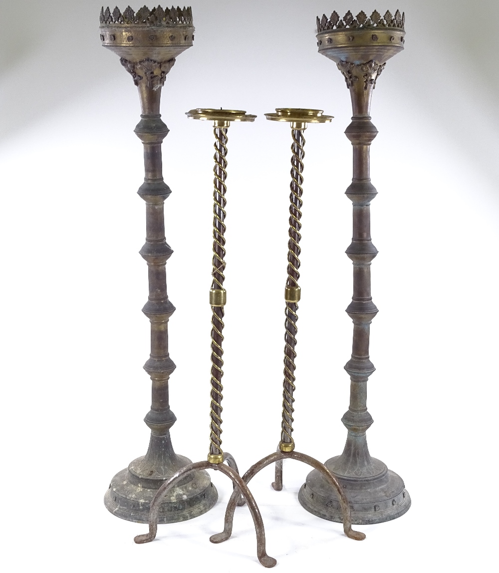 A pair of Victorian Gothic brass floor standing candle holders, height 95cm, and a pair of brass - Image 2 of 3