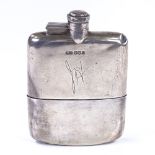 A George V curved silver hip flask, with screw top and removable cup, by James Dixon & Sons Ltd,
