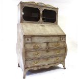 A Continental painted bureau cabinet with glazed cupboards above, fall-front and bombe-shaped drawer