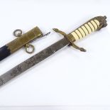 A Royal Navy midshipman's dirk, Final pattern (1891 - 1960), with etched nickel plate blade, brass