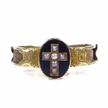 A Victorian 15ct gold split-pearl and black enamel memorial ring, with central cross panel, engraved