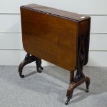 A Victorian walnut Sutherland occasional table